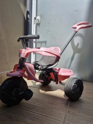 Triciclo rosa bandeirantes