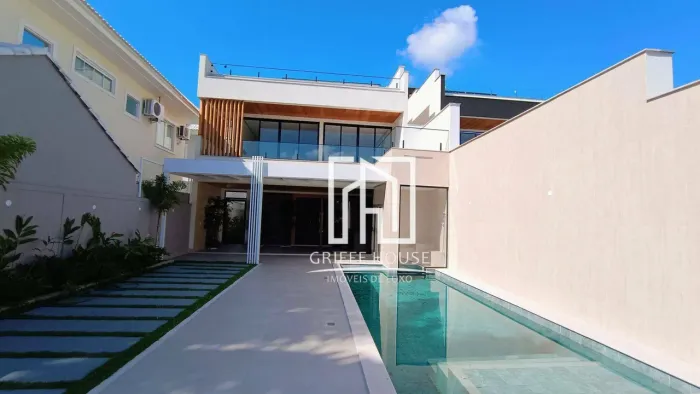 CASA A VENDA NO CONDOMINIO RIO MAR - PROJETO CONTEMPORÂNEO - 380m DE TERRENO.