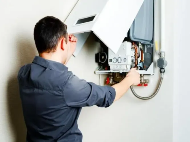 Conserto manutenção em aquecedor a gas