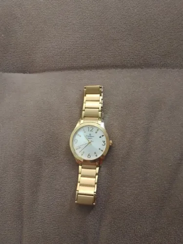 Vendo relógio banhado a ouro parado