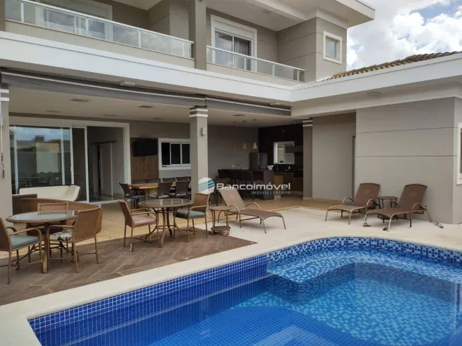 Casa com 4 dormitórios à venda, 426 m² por R$ 2.500.000,00 - Condomínio Athenas - Paulínia