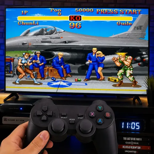 Game Stick 4k retro que conecta a TV via HDMI, vem com 2 controles e de 10 000 mil jogos