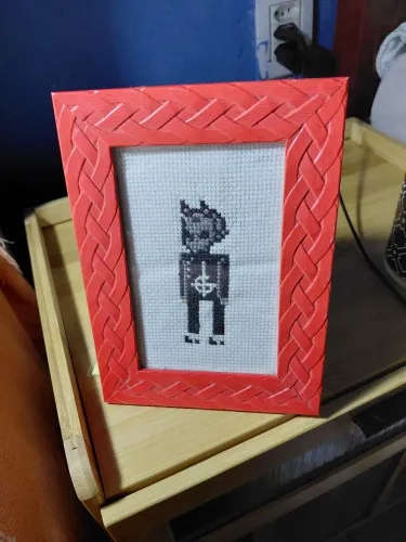 Quadro bordado em ponto cruz de Nameless Ghoul da banda Ghost