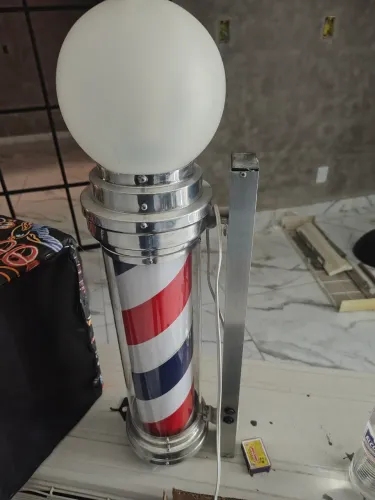 Barber pole giratório