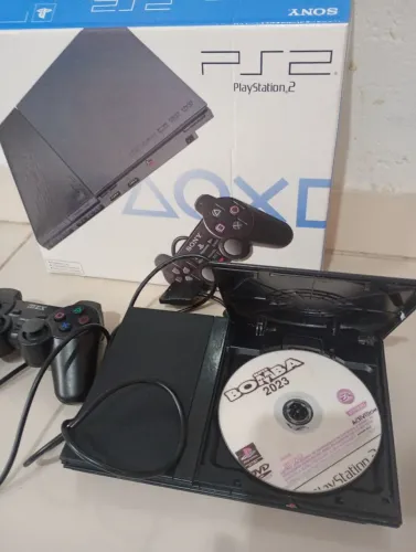 PS2 destravado Matrix caixa repro 2 cds parelelo