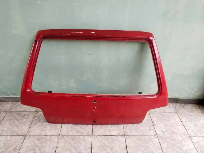 Tampa traseira Fiat Uno Pitbull 2004 até 2013 Original em 10 vezes sem juros no cartão cré
