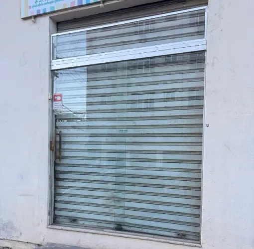 PORTA DE VIDRO PARA COMÉRCIO - SEMINOVA DE CORRER