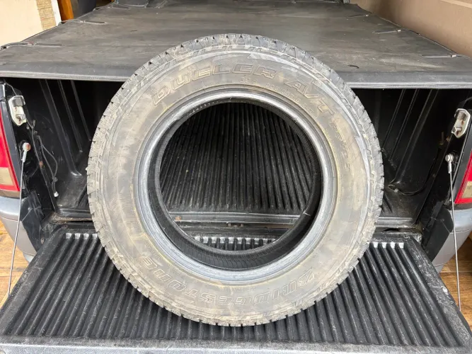 Pneu Bridgestone Aro 15 Dueler A/T Revo 2 205/65R15 (usado)