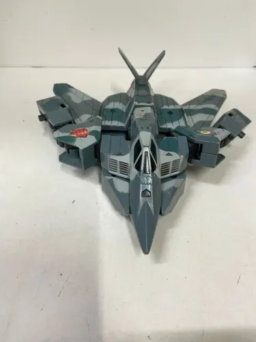 Brinquedo Transformers Avião bombardeiro  Macross DV0071*