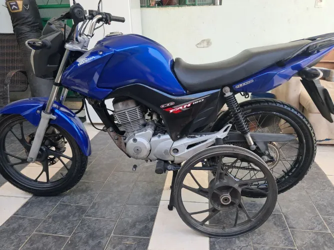 150 fan muito bem conservada vendo ou troco em outra moto de maior cilindrada