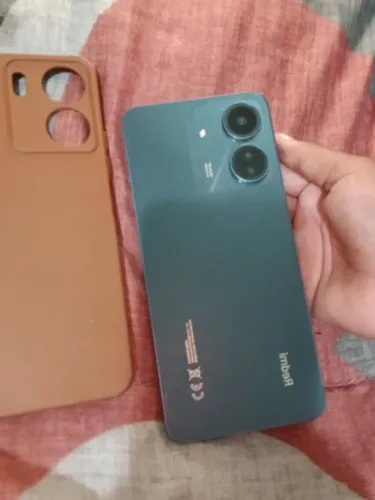 Vendo celular redimir 13c  tem caixa 