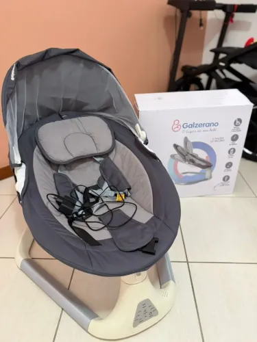 Cadeira de balanço para bebê motorizado. 3 velocidades. C/ músicas de ninar.