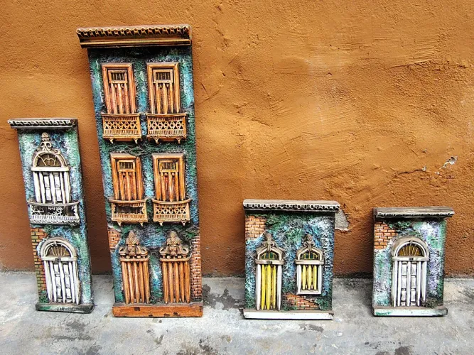 Vendo 4 quadros entalhado na madeira antigos 1,200,00
