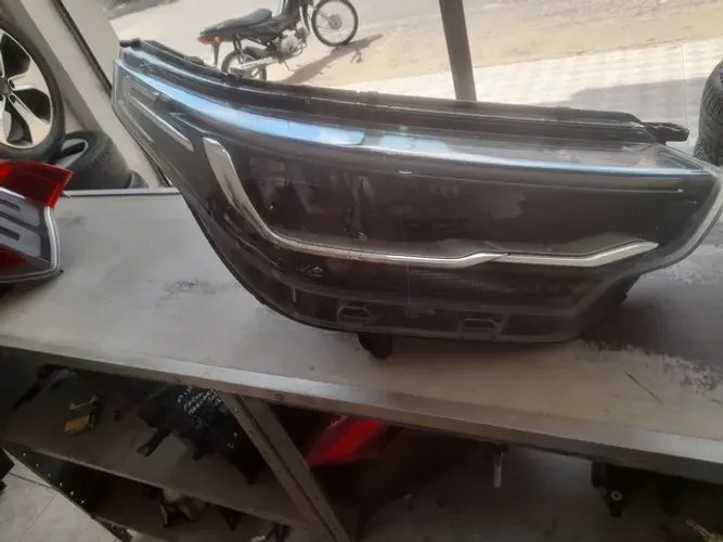 Farol da Fiat Strada tenho o par.