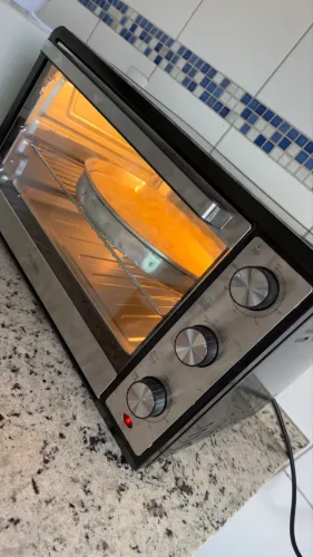 Forno Elétrico de Bancada Philco Multifuncional Grill 66L com Lâmpada Preto PFE66