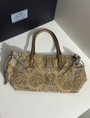 bolsa baguete vintage 70s dourada