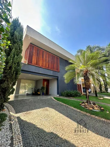 Sobrado de Luxo com Fachada em Aço Corten, 4 Suítes, Cinema e Lazer Comple