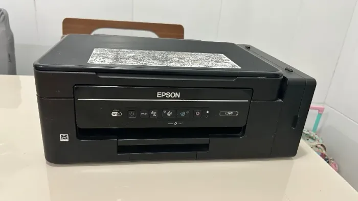 Impressora L395 com defeito.