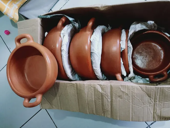 Jogo de panela de barro 