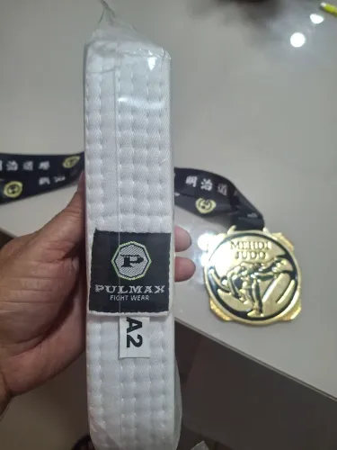Faixa judô e medalha