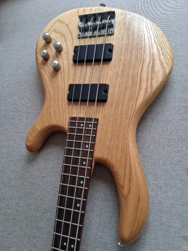 Baixo Cort Action DLX  