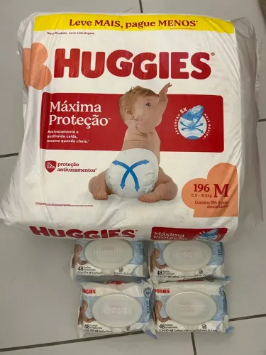 FRALDA HUGGIES 196un + 4 LENÇOS UMIDECIDOS
