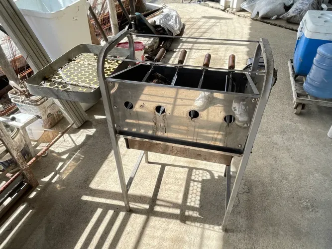 Churrasqueira carvão inox com giro de carne elétrico