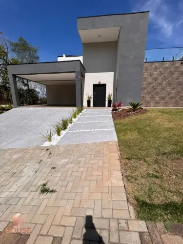 Casa com 4 dormitórios à venda, 300 m² por R$ 1.750.000,00 - Condomínio Reserva Ibirapitan