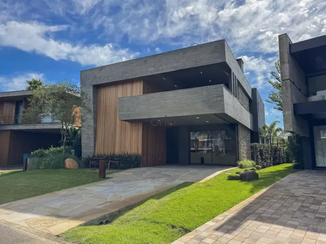 Casa beira lago com 6 suítes no Condomínio Enseada, Xangri-Lá REF: SO0352