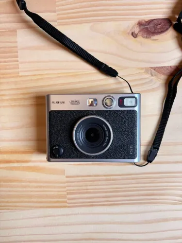 Fujifilm Instax Mini Evo ? Seminova + Case e Acessórios