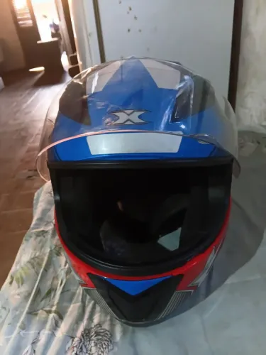 Vendo capacete seminovo da marca teex+ jaqueta da Honda 