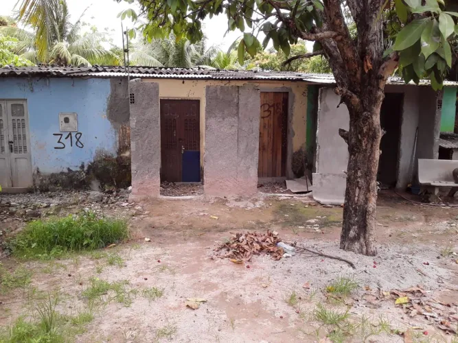 Vendo terreno com duas casas e um kitnet 