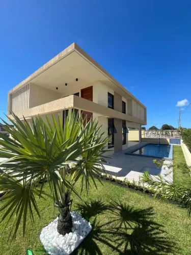 Casa com 3 dormitórios à venda, 108 m² por R$ 700.000,00 - Carapibus - Conde/PB