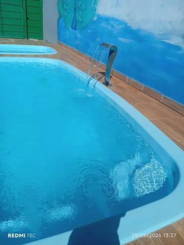 Espaço kadmiel com piscina