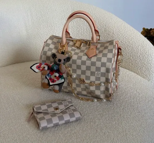 Bolsa Louis Vuitton em couro speedy bandouliere 25