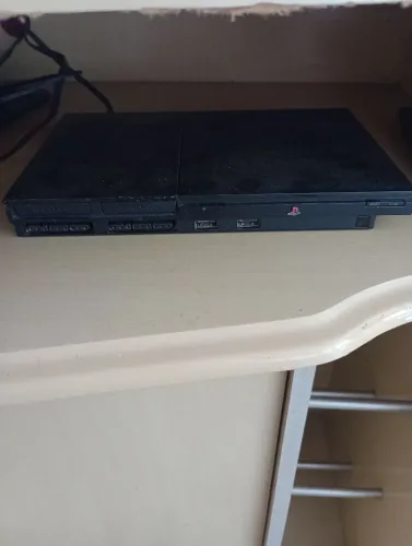 PLAYSTATION 2 SLIM COM 25 JOGOS+ MANETE NOVA + CABOS NOVOS ( LEIA A DESCRIÇÃO)