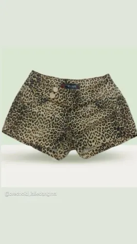Short estampa onça