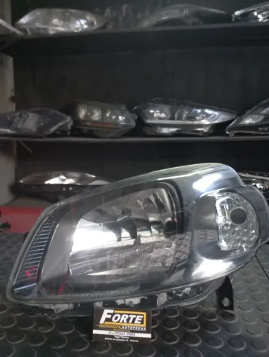 Farol esquerdo Fiat Uno 2011 a 2014 MASCARA NEGRA