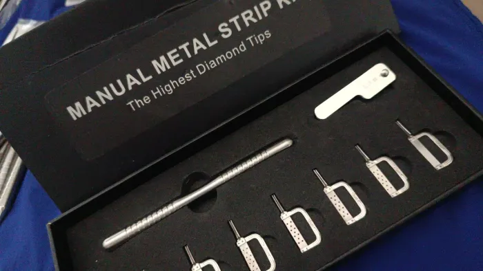 Manual metal strep odontológico