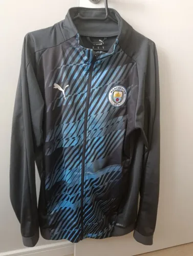 Jaqueta Manchester city 