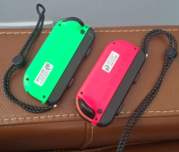 Joycon original Nintendo Switch com Strap