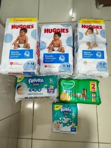 15 pacotes de fraldas