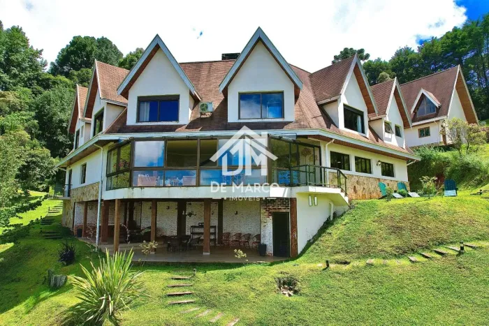 Casa com 6 dormitórios à venda, 517 m² por R$ 6.500.000,00 - Condomínio Morro Pedra do Fog