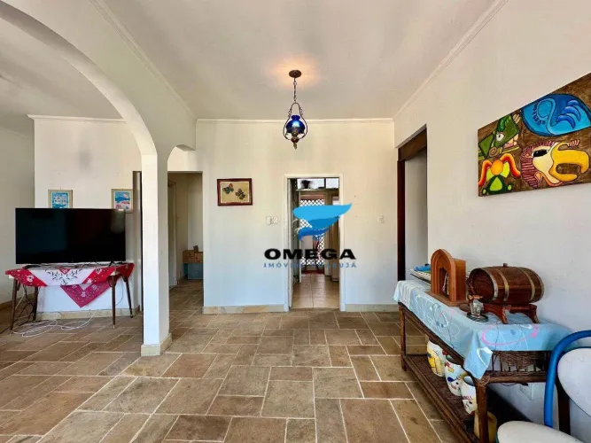 Apartamento com vista parcial para o mar na Praia das Pitangueiras no Guarujá | Omega Imóv