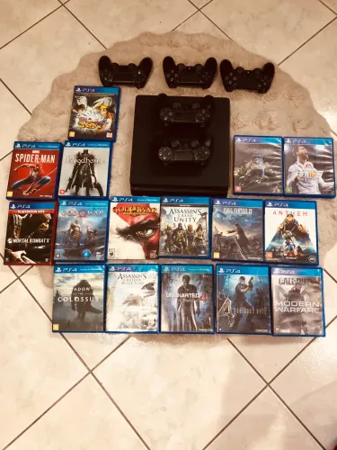 Vendo Ps4 +16 jogos, +Hd de 1Terabyte de memória, +16 jogos físicos, +5controles
