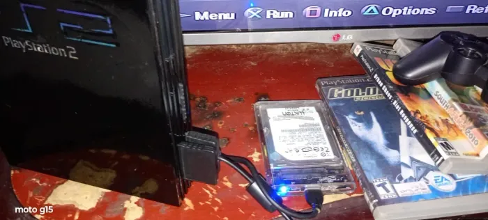 PS2 FAT desbloqueado lendo no leitor