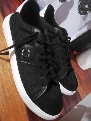 Vendo tenis da coca cola original .