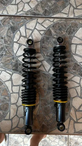 par de amortecedores com regulagem moto elétrica
