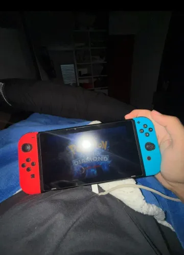 Nintendo Switch + 4 Jogos