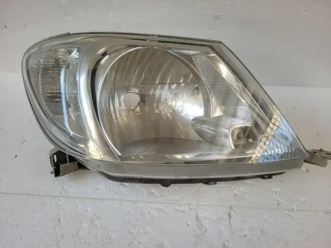 Farol direito hilux 2009 10 11